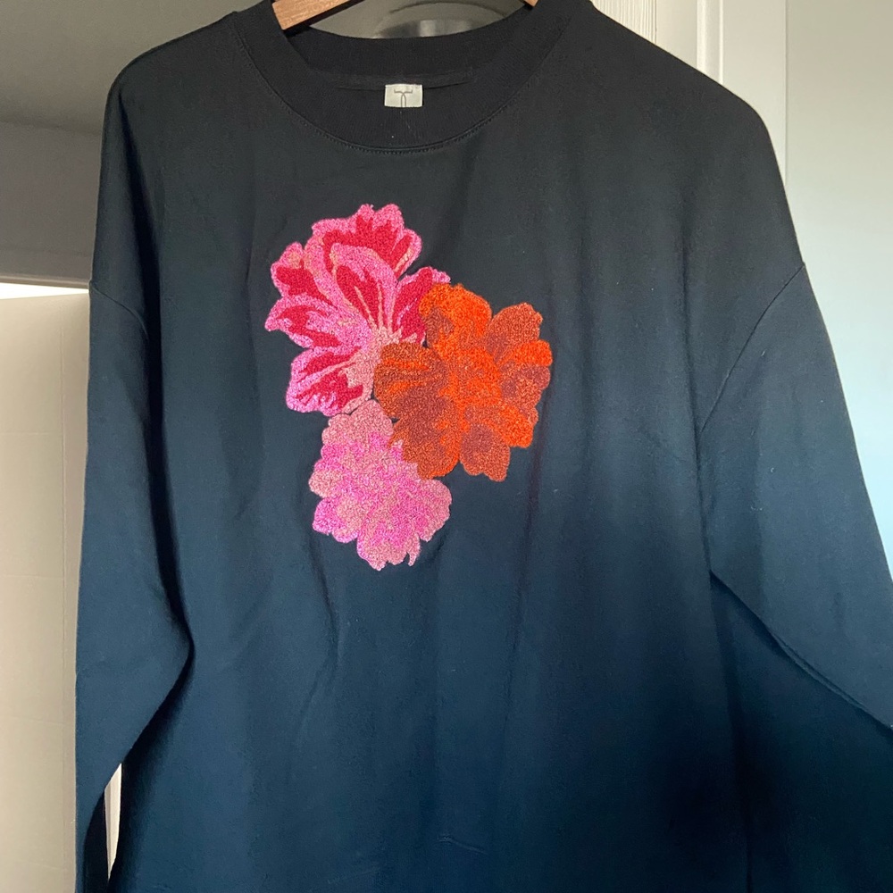 Tristan Black Top with Floral Accents